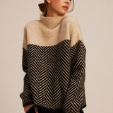 "Norah | Maglione in Cotone con Collo Alto" can be rewritten as "Norah | Maglione in Cotone con Collo Alto Elegante".