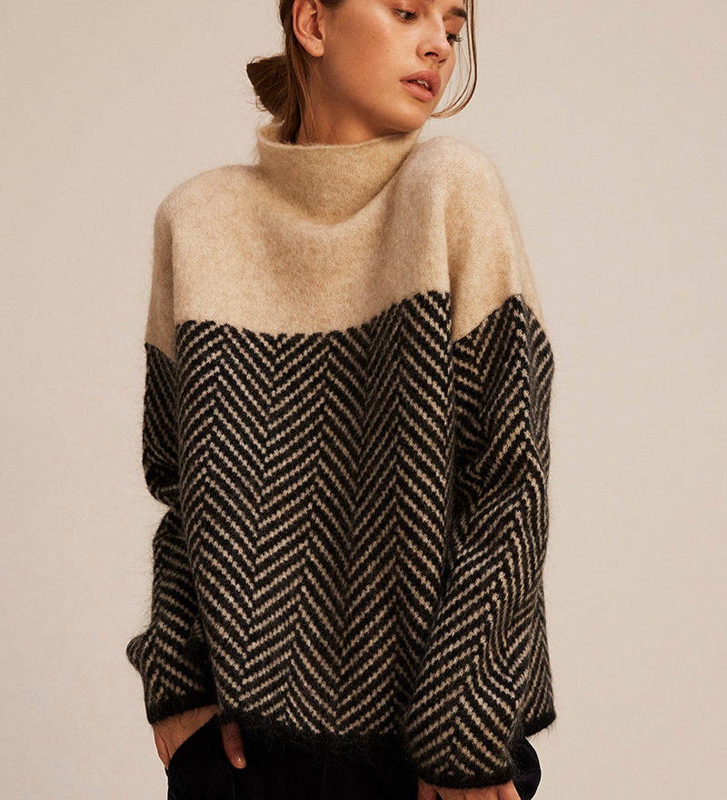 "Norah | Maglione in Cotone con Collo Alto" can be rewritten as "Norah | Maglione in Cotone con Collo Alto Elegante".