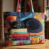 Borsa artigianale trapuntata con gatto nero, libri e tazze
