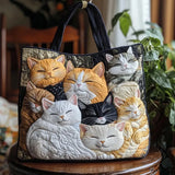 Borsa artigianale trapuntata con gattini addormentati