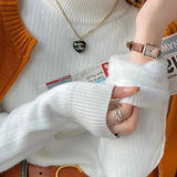 Em™ Maglione
