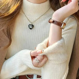 Em™ Maglione