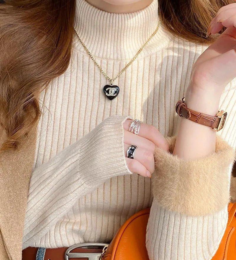 Em™ Maglione