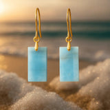 Orecchini con pietre blu brillanti