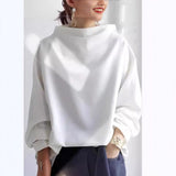 Lisa | Top Casual con Collo Alto" can be rewritten as "Lisa | Casual High-Neck Top.