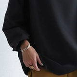 Lisa | Top Casual con Collo Alto" can be rewritten as "Lisa | Casual High-Neck Top.