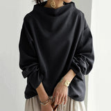 Lisa | Top Casual con Collo Alto" can be rewritten as "Lisa | Casual High-Neck Top.